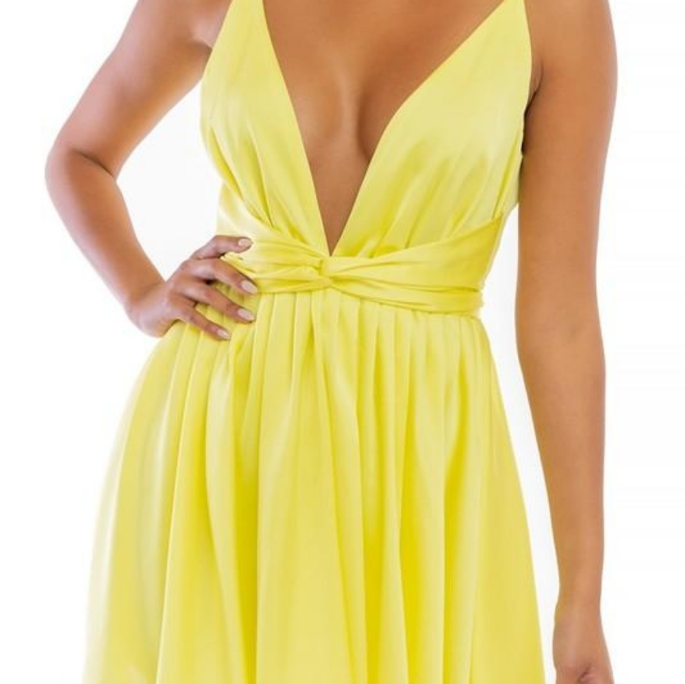Turn heads in this skater cut plunging yellow sati